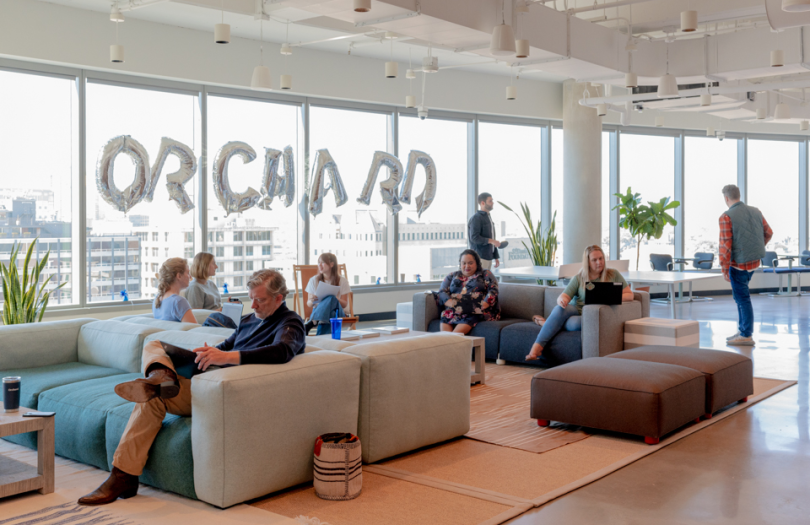 Orchard employees working in our Austin office lounge