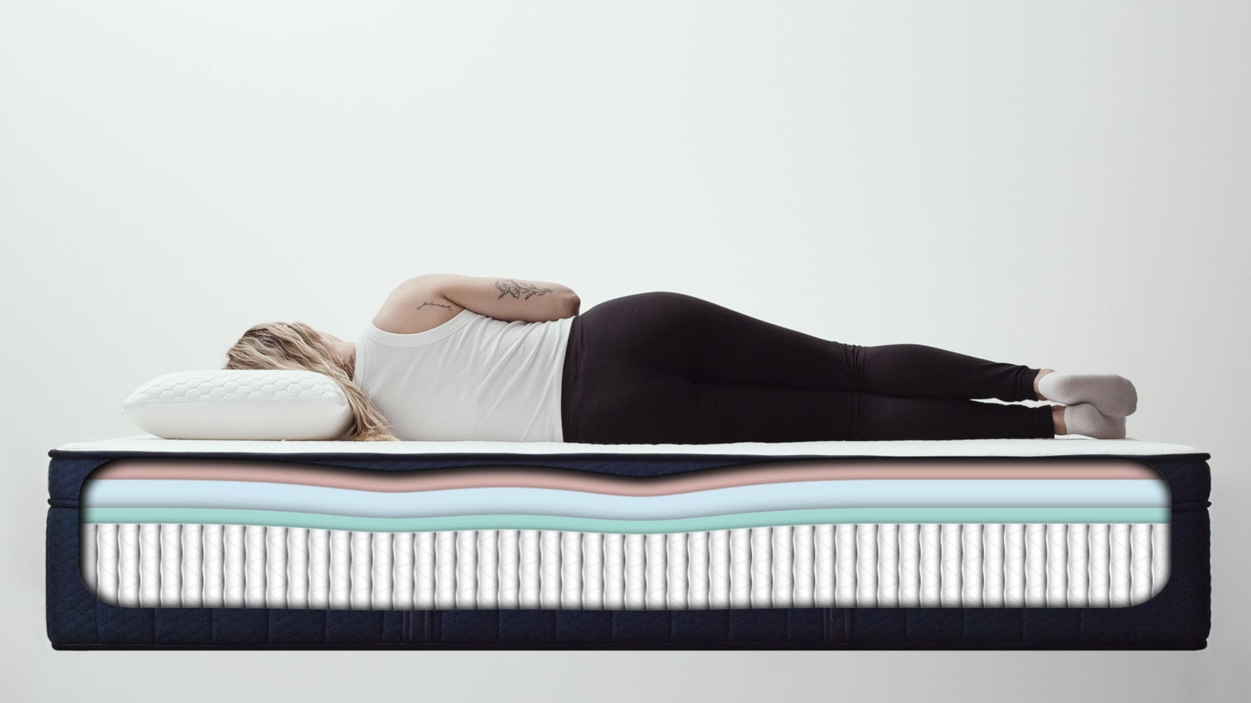 woman laying on side on Brooklyn Bedding Aurora Luxe