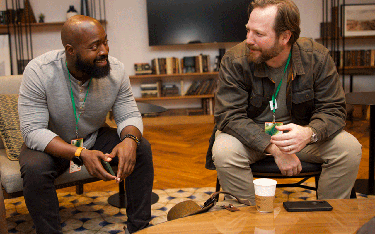 Two Zapier employees chatting