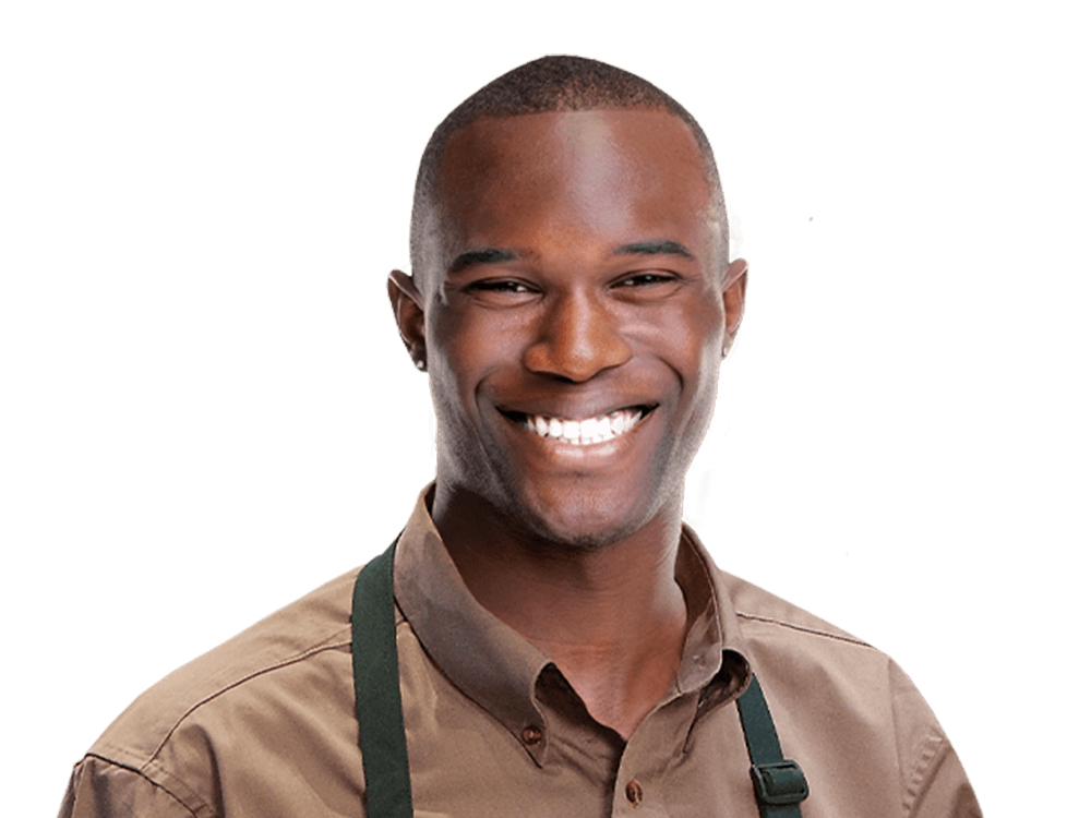 Male cashier smiling