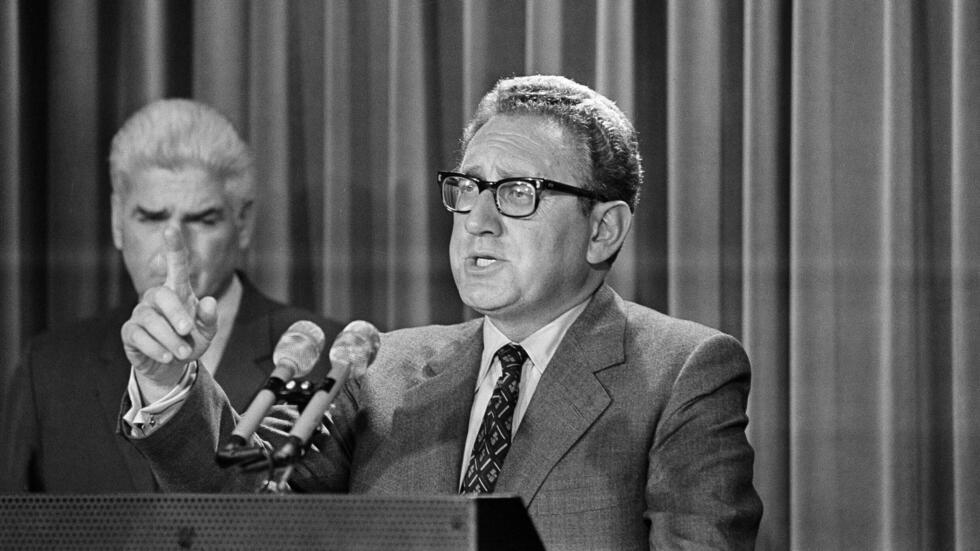 National Security Advisor Henry Kissinger tells a White House news conference that “peace is at hand” in Vietnam but one more negotiating session is necessary, on October 26, 1972.