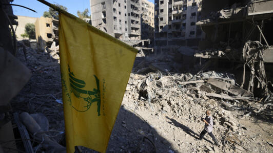 A Hezbollah flag at the site of the strike that killed leader Hassan Nasrallah in Beirut's southern suburbs, pictured on September 29, 2024.