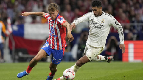 Marcos Llorente na Atletico Madrid tare da Jude Bellingham na Real Madrid yayin fafata gasar La Liga tsakanin Atletico Madrid da Real Madrid a filin wasa na Metropolitano da ke Madrid, Spain. 29/09/24