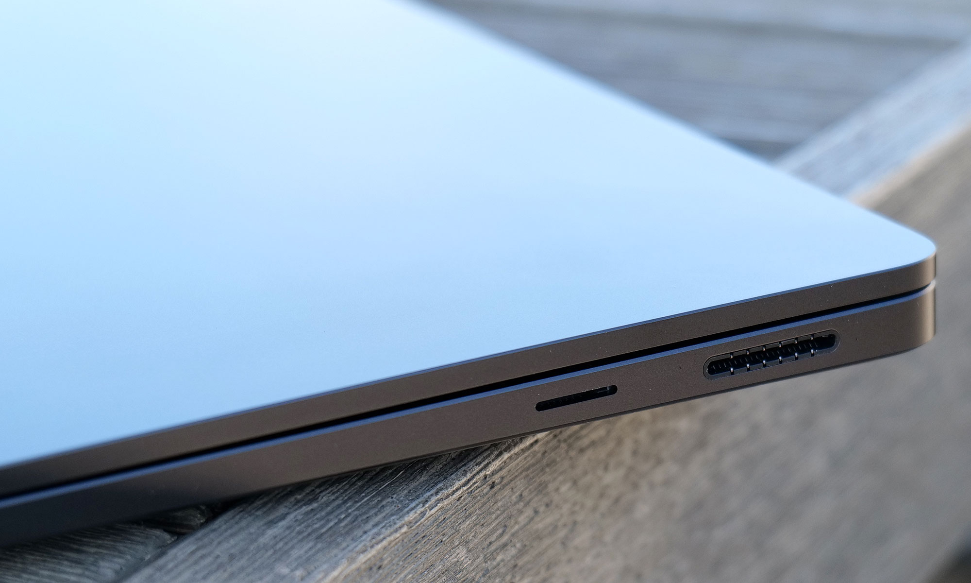 The right side of the Surface Laptop 7 features Microsoft's magnetic Surface Connect port and a microSD card reader. 