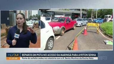 Reparos em pista de acesso da Av. Maringá para Av. Ayrton Senna deixa trânsito lento - Parte do asfalto cedeu na rotatória com a R. Bento Munhoz da Rocha Neto.