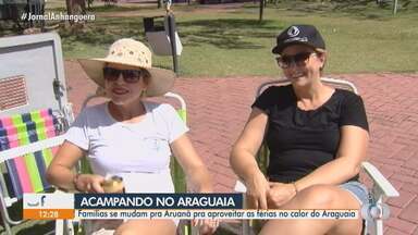 Turistas aproveitam as férias às margens do Rio Araguaia, em Goiás - Região oferece várias opções de lazer e esporte dentro e fora da água.