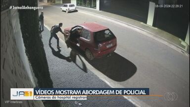 Câmeras de segurança filmam quando policial suspeito de matar adolescente o tira de carro - Câmeras mostram o suspeito tirando o menino do porta-malas.