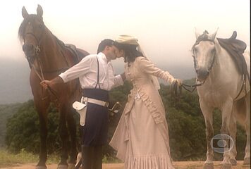 Cena em que Floriano (Tony Ramos) desabafa com mestre Quirino (Milton Gonçalves), ao sentir-se dividido entre Joana (Helena Ranaldi) e Lavínia (Vivianne Pasmanter), que é a reencarnação de seu grande amor no passado, Valentina (Carolina Kasting).