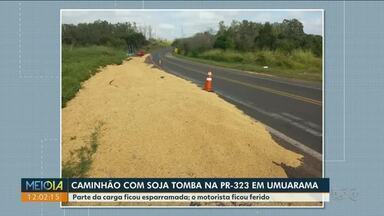 Caminhão com soja tomba na PR-323 em Umuarama - Parte da carga ficou esparramada. O motorista ficou ferido.