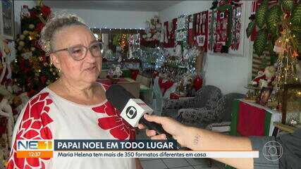 Apaixonada pelo Natal, Maria Helena Moura Martins coleciona mais de 350 bonecos de Papai Noel em casa, no Recife