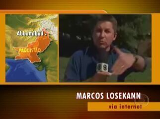 O repórter Marcos Losekann fala ao vivo, direto de Abbottabad, Paquistão, em frente à casa onde o terrorista Osama Bin Laden foi morto. Bom Dia Brasil, 03/05/2011.