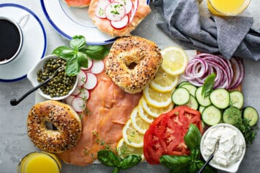 Bagels and lox platter for breakfast with vegetables and cream cheese (Kurman Communications LLC)