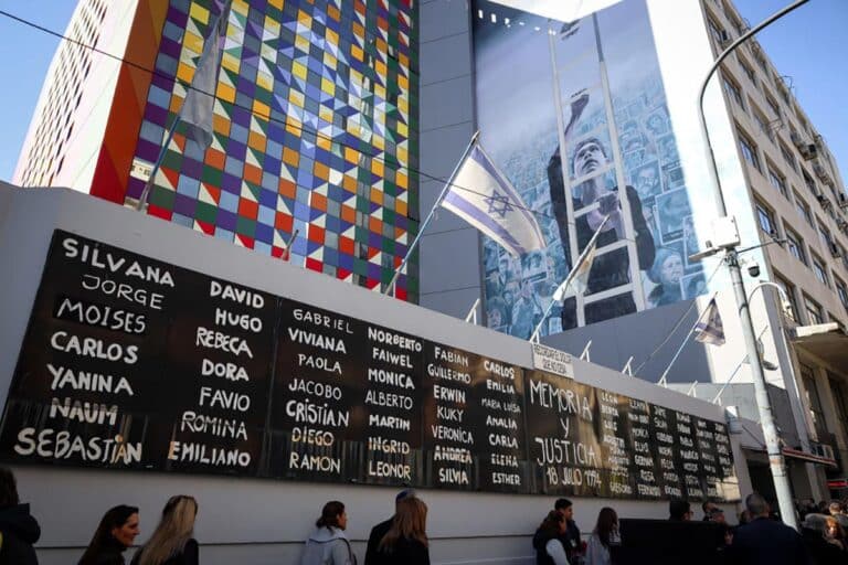 18 July 2024, Argentina, Buenos Aires: The names of the victims of the bomb attack on the Jewish community center Amia can be read on the facade of the building.