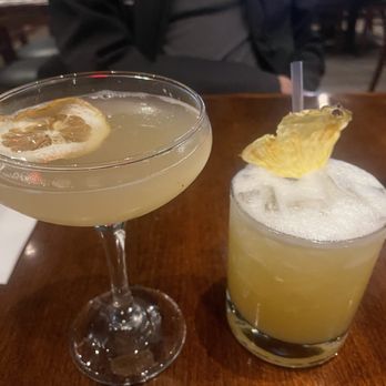 Whiskey drinks (pineapple sour on right)