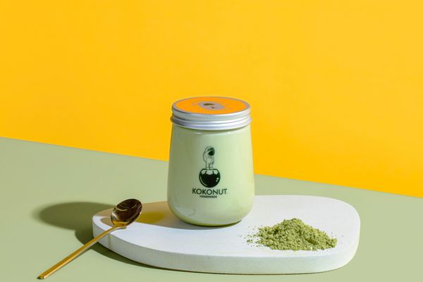 Photo of bobaTEAque - Orange, CA, US. a jar of matcha powder and a spoon