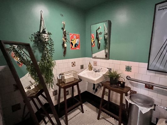 Photo of Fito - New York, NY, US. a bathroom with green walls and white tile