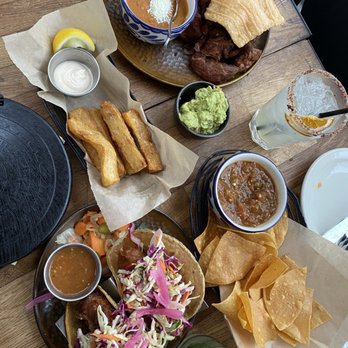 Chicharrones (top), yuca fritas (middle), fish tacos (bottom)