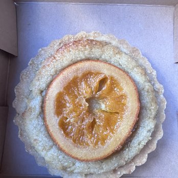 5" chamomile orange frangipane tart. Contains tree nuts (coconut, almond), wheat, soy $11 and everything on menu is vegan I believe