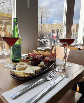 Photo of Fito - New York, NY, US. Cheese and charcuterie board with some wine