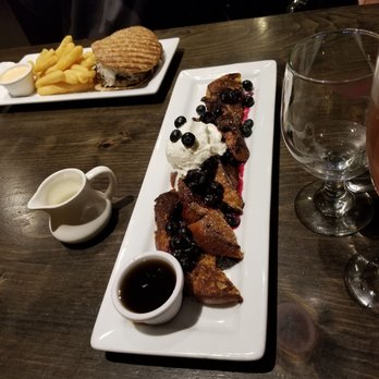 Raspberry French toast and whipped cream.