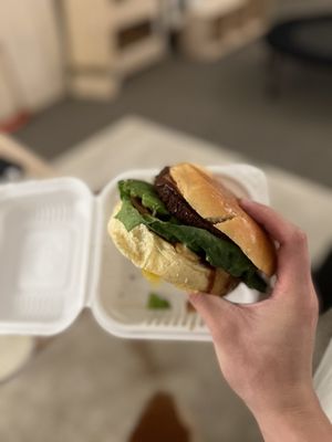 Photo of Nish Nush - New York, NY, US. a person holding a sandwich