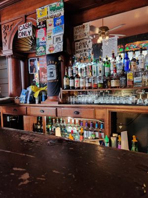 Photo of The Saloon - San Francisco, CA, US. The bar. Notice the cut up beer boxes posted so you know what they have.