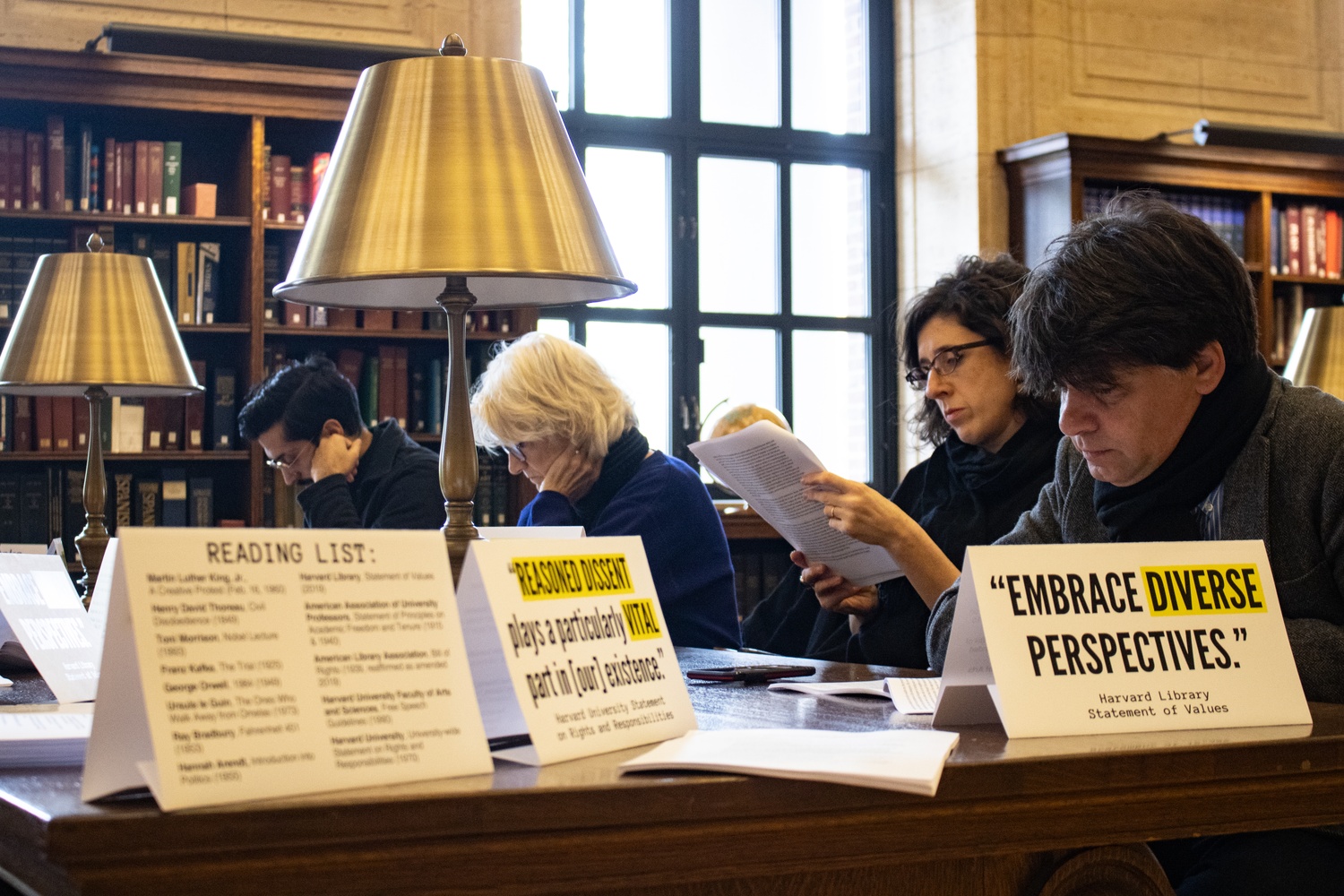 Harvard faculty members stage a silent study-in in Widener Library's Loker Reading Room.