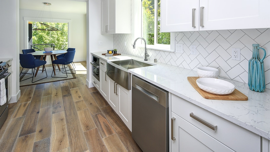 bright kitchen with white cabinets