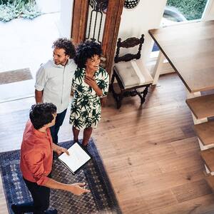 Couple enter house stairs