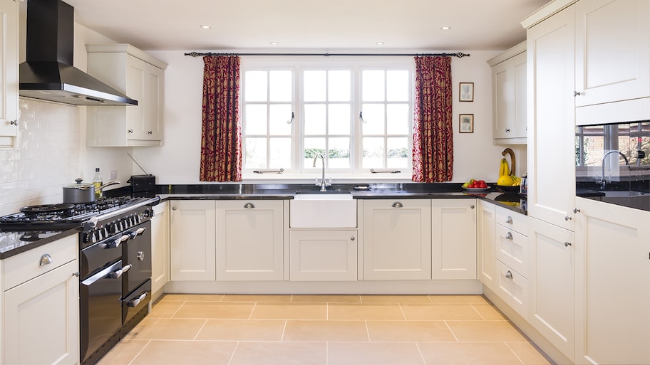 white farmhouse kitchen with porcelain floor