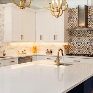 A modern kitchen with beautiful pattern tile as backsplash