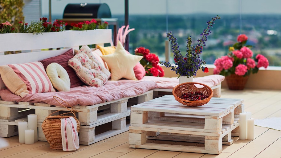 A bench and a coffee table both made from pallets