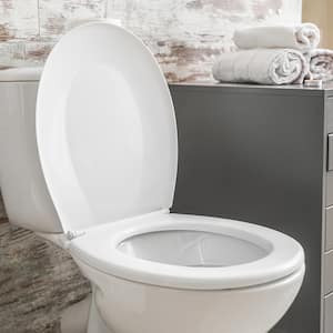 Toilet with lifted lid in stylish bathroom