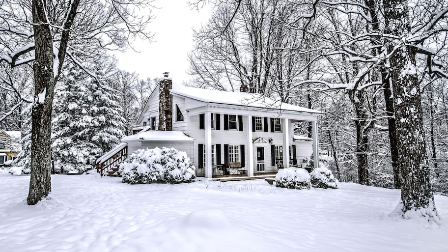 A vintage old house in fresh snow