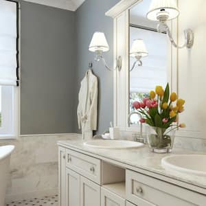 A white bathroom with two sinks
