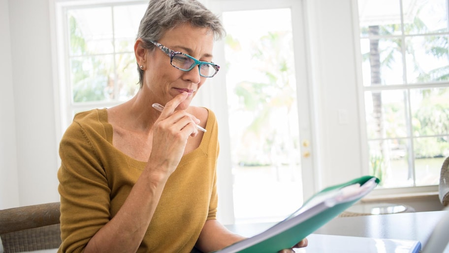 A woman reading inspection report