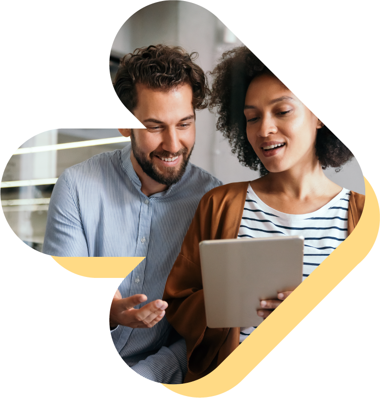 Male and female looking at mobile device