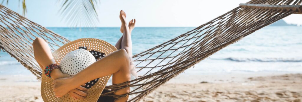 Relaxing in hammock at beach