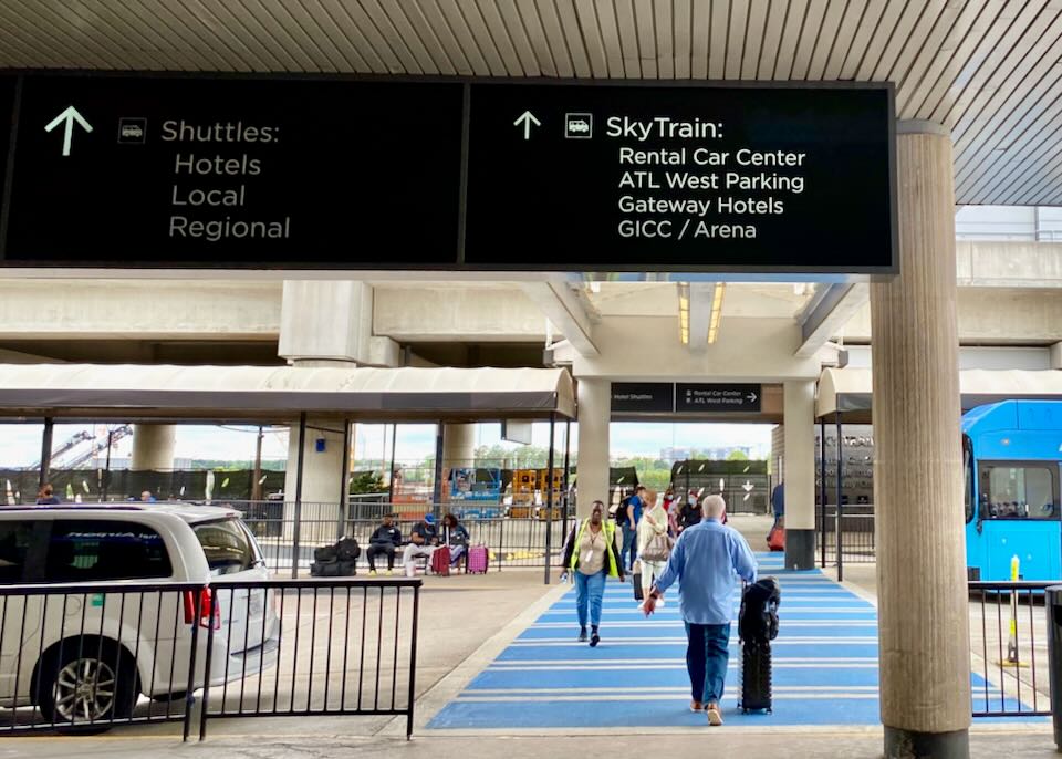 Blue cross walk to the Sky Train