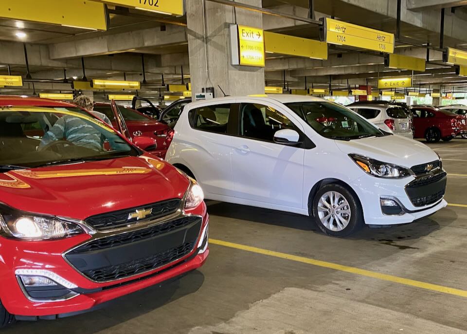 Two cars parked in the garage.