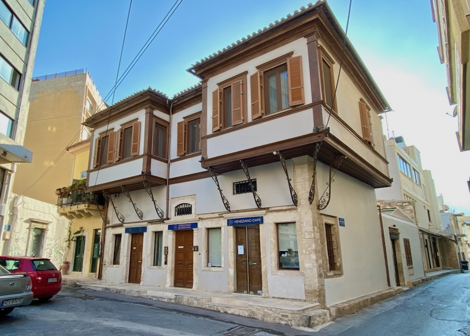 Historic architecture with a stone-built Venetian ground floor and cantilevered Ottoman upper floor at Veneziano Boutique Hotel in Crete