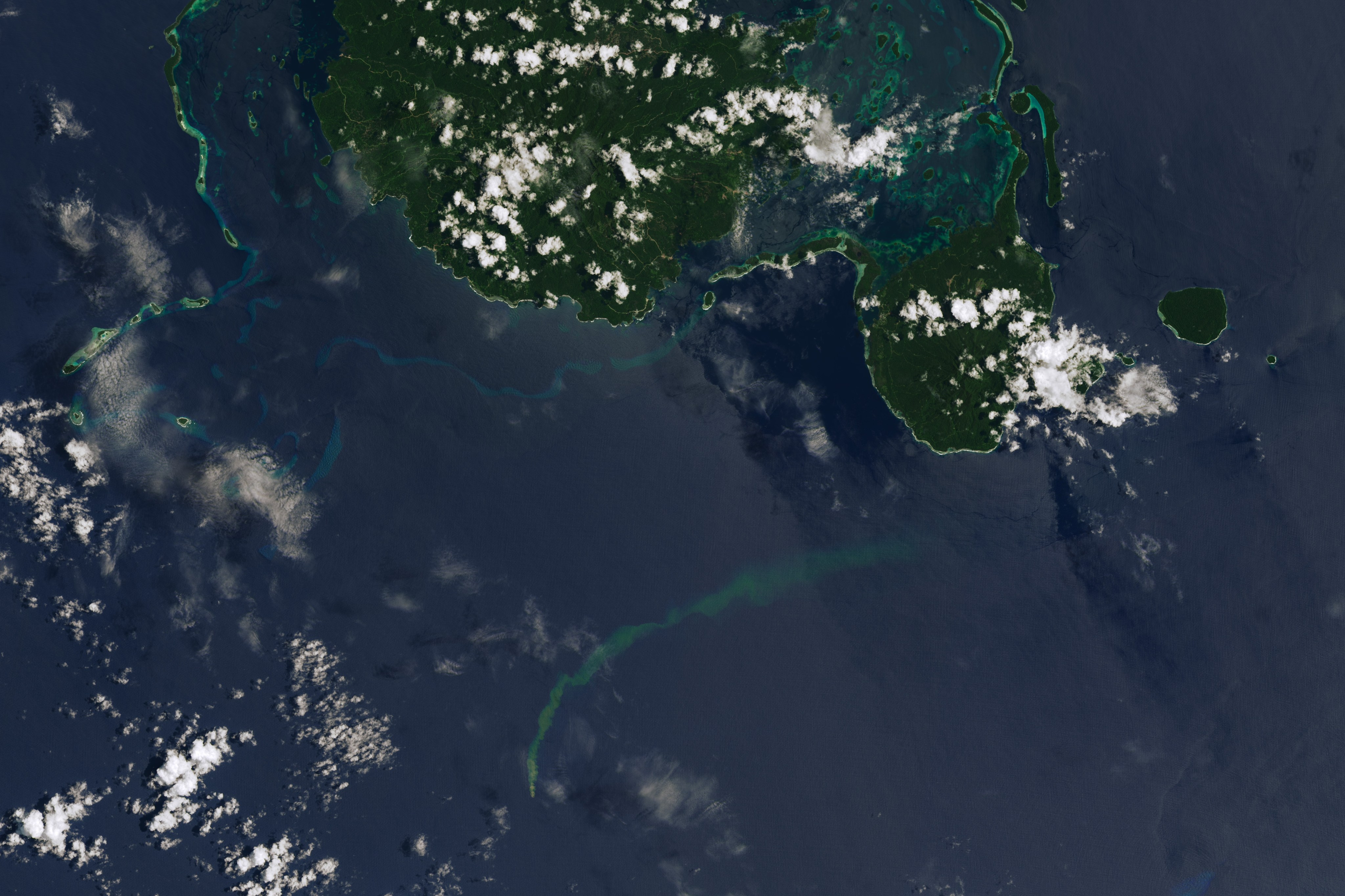 The image above, acquired on March 8 by the OLI (Operational Land Imager) on Landsat 8, shows a plume of discolored water near the undersea volcano. The plume drifted north-northeast toward Nggatokae Island. Vangunu Island, also pictured, lies about 24 kilometers (15 miles) north of Kavachi, and Papua New Guinea is about 800 kilometers (500 miles) to the west.