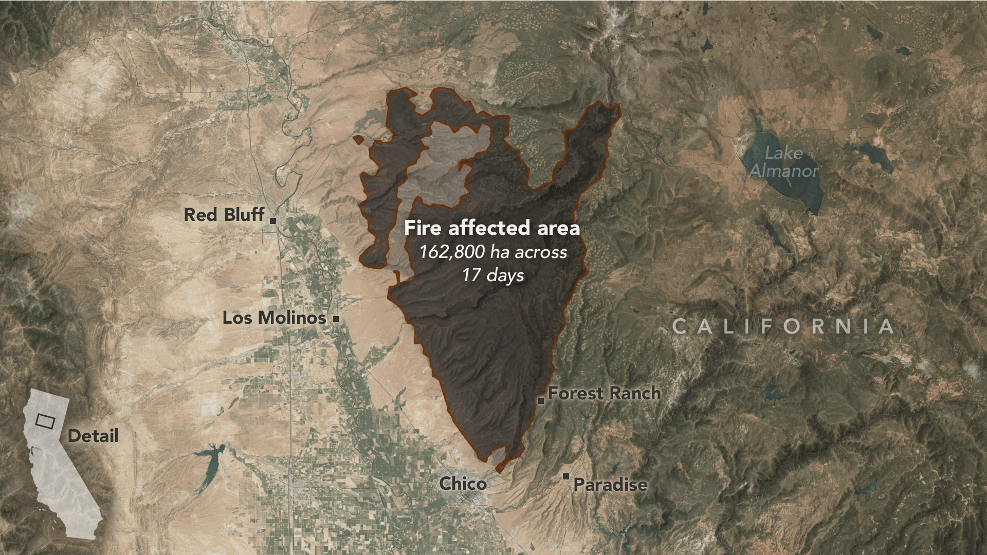 A dark V shaped region is outlined in orange. Below the burned region are the cities of Forest Ranch, Paradise, and Chico. Los Molinos and Red Bluff are to the left. The land to the right is more mountainous and sage green, to the left the land appears to be a valley and primarily beige but land appears to be farmed along the river flowing down the center of the valley.