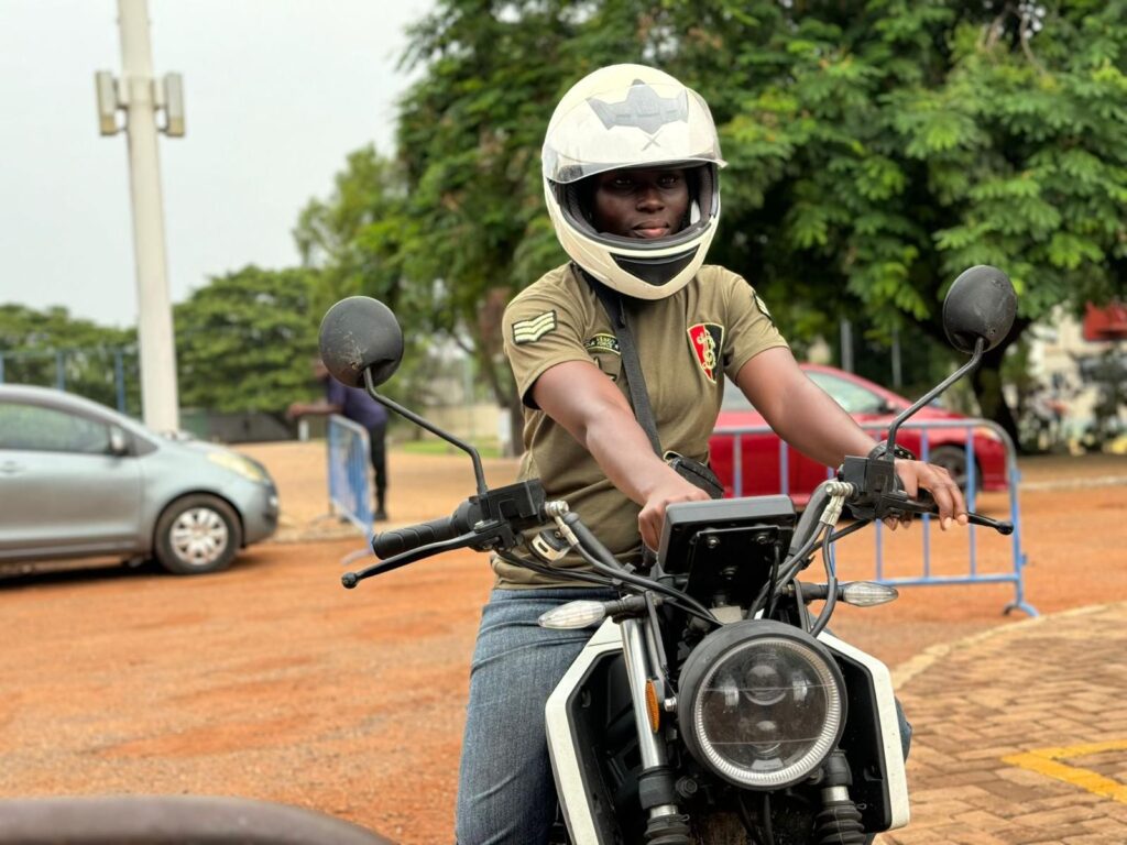 Female electric motorcycle rider