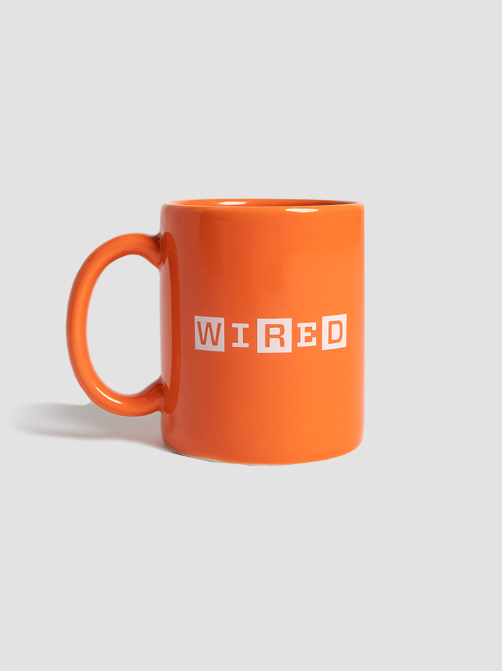 The WIRED/TIRED 11oz Coffee Mug Orange Side 1