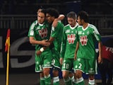 St Etienne's Mevlut Erding, Brandao, Fabien Lemoine and Benoit Tremoulinas celebrate after Erding opened the scoring during the French L1 football match between Olympique Lyonnais (OL) vs Saint-Etienne (ASSE) at the Gerland stadium in Lyon, central easter