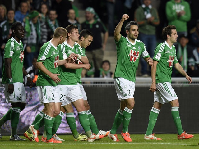 St Etienne's French defender Loic Perrin celebrates after scoring during the French L1 football match Saint-Etienne vs Ajaccio at the Geoffroy-Guichard stadium in Saint-Etienne, central France, on May 17, 2014