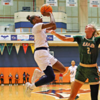 UTSA forward Jordyn Jenkins attempts a jump shot over a UAB defender