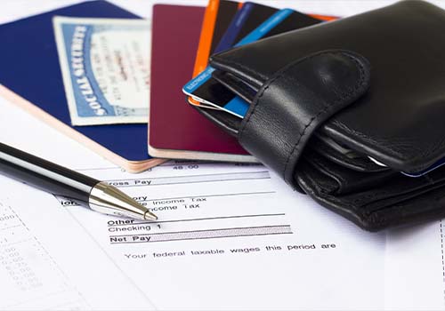 Social Security Card Next To Wallet With Credit Cards