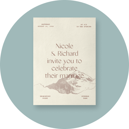 A cream-colored invitation with a subtle sketch of a mountain on a light blue backdrop.